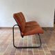 Strafor 3-seater bench, orange upholstery and sled base, 1970s.