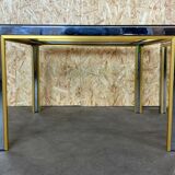 Tables basses en chrome & laiton