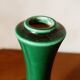 Green ceramic baluster vase