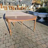 12-foot round oak table with 7 extensions / 20 people