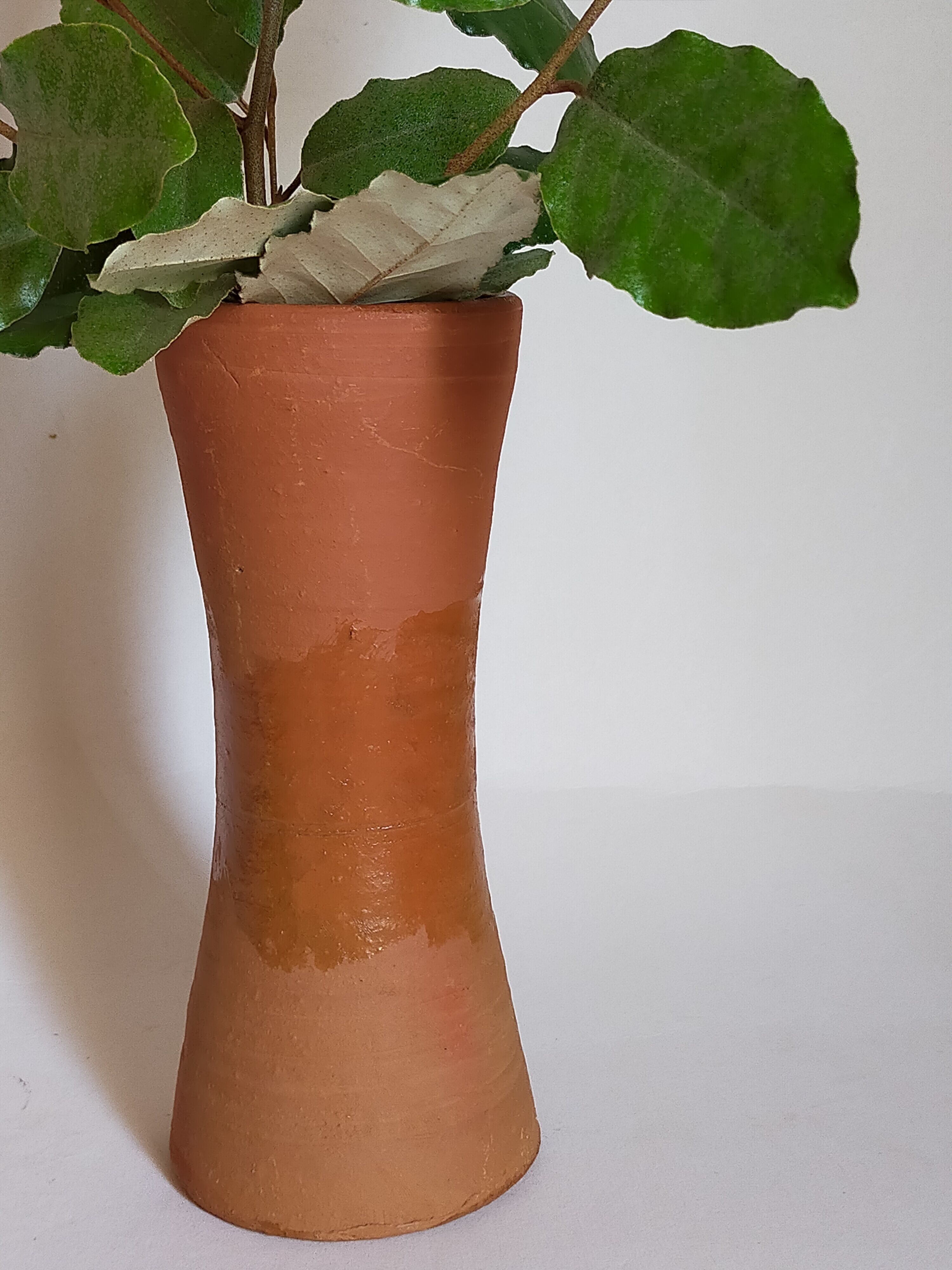 Potter's "Diabolo" vase in vintage glazed terracotta