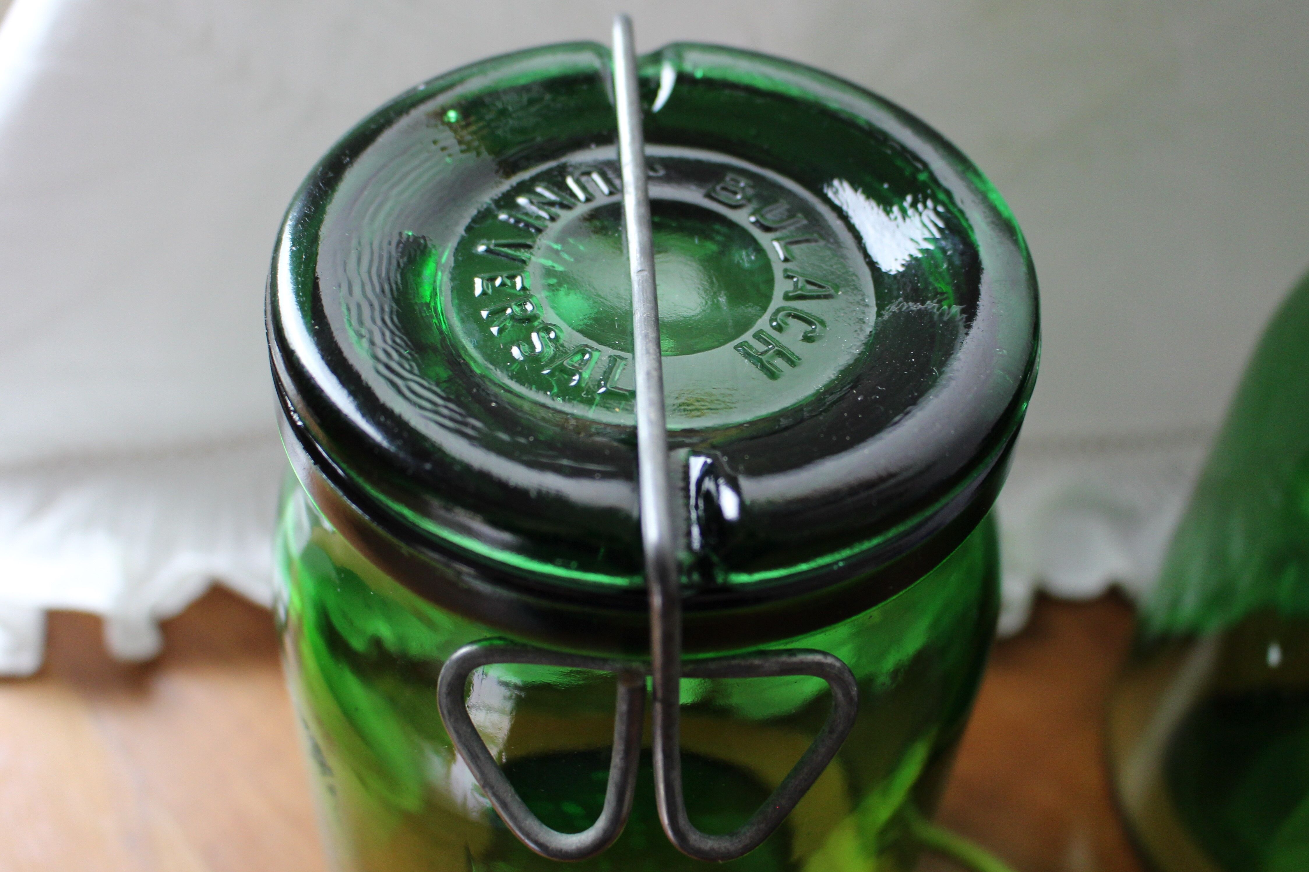 batch of 2 green jars "Made in Switzerland"