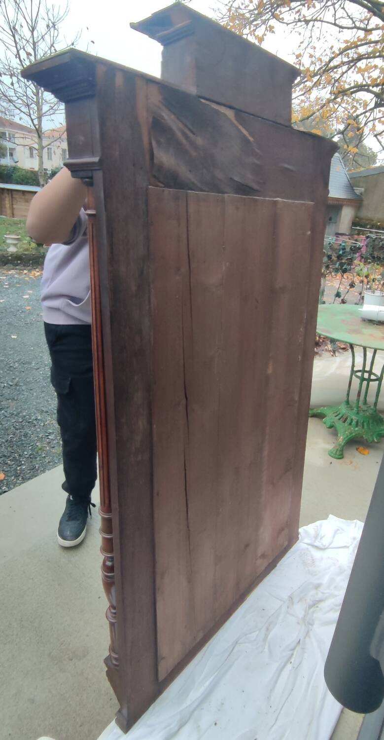 Old large carved wooden mirror
