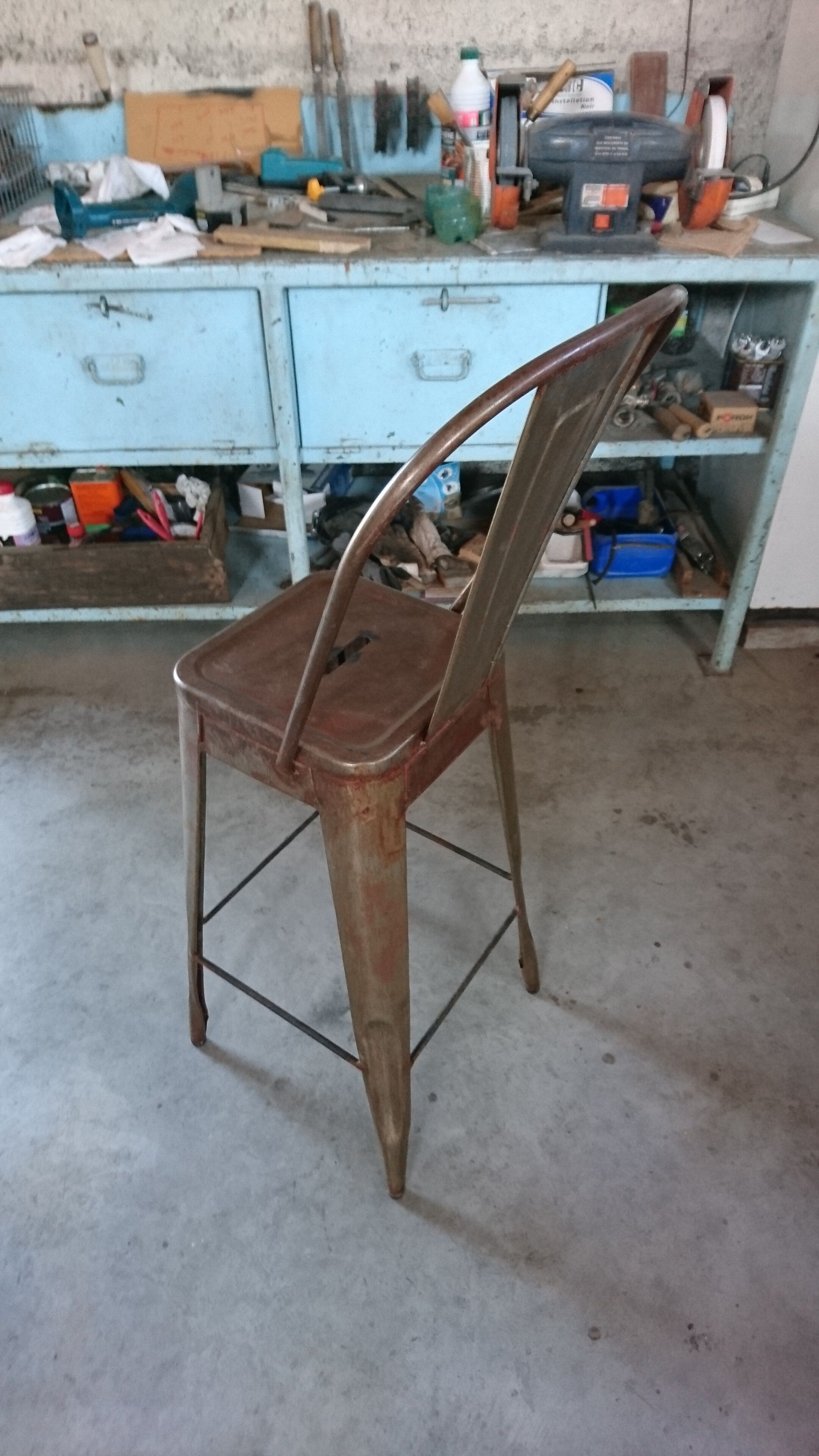 Aged industrial stool