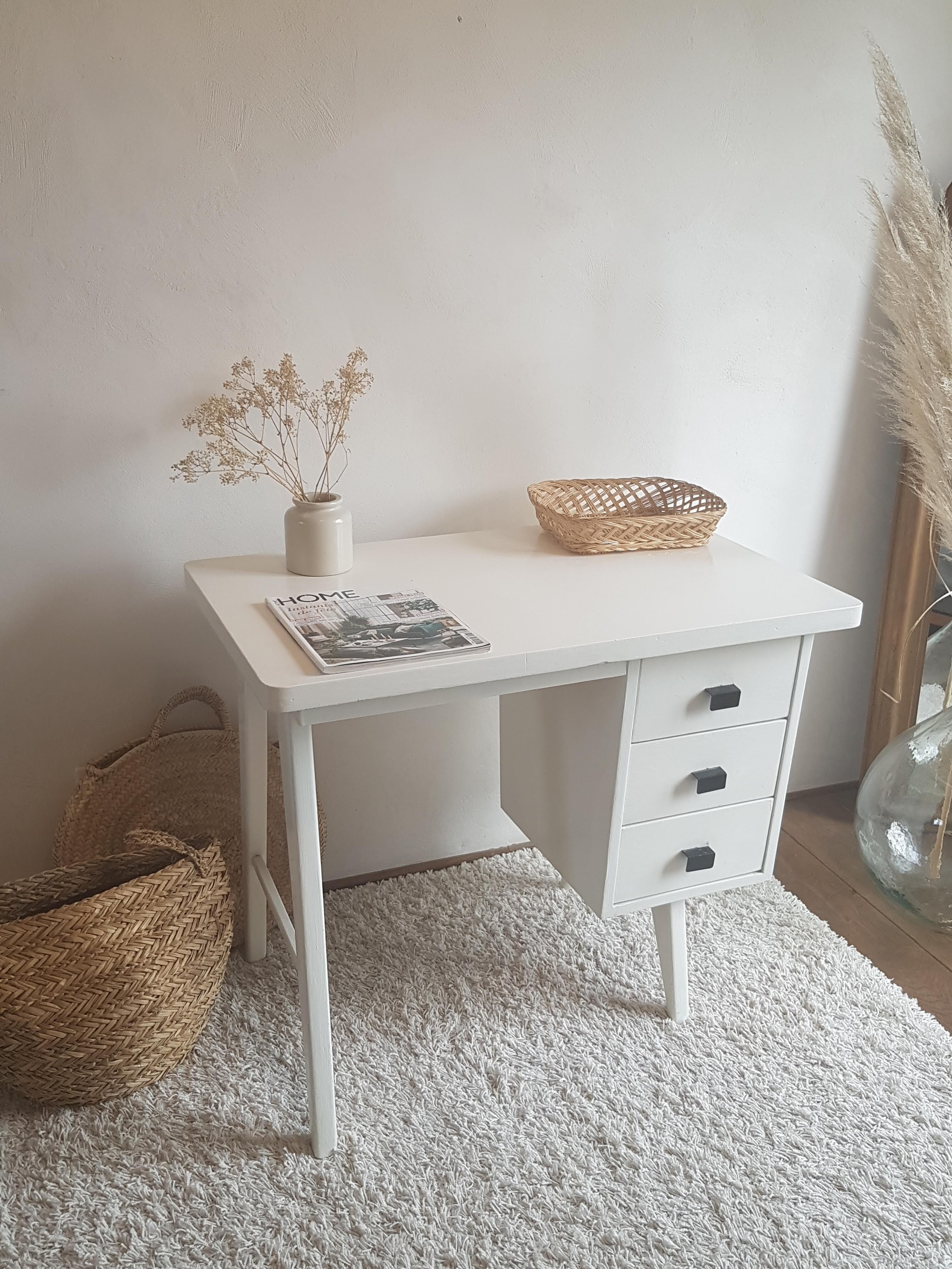 White desk with compass feet circa 1960