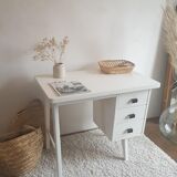 White desk with compass feet circa 1960