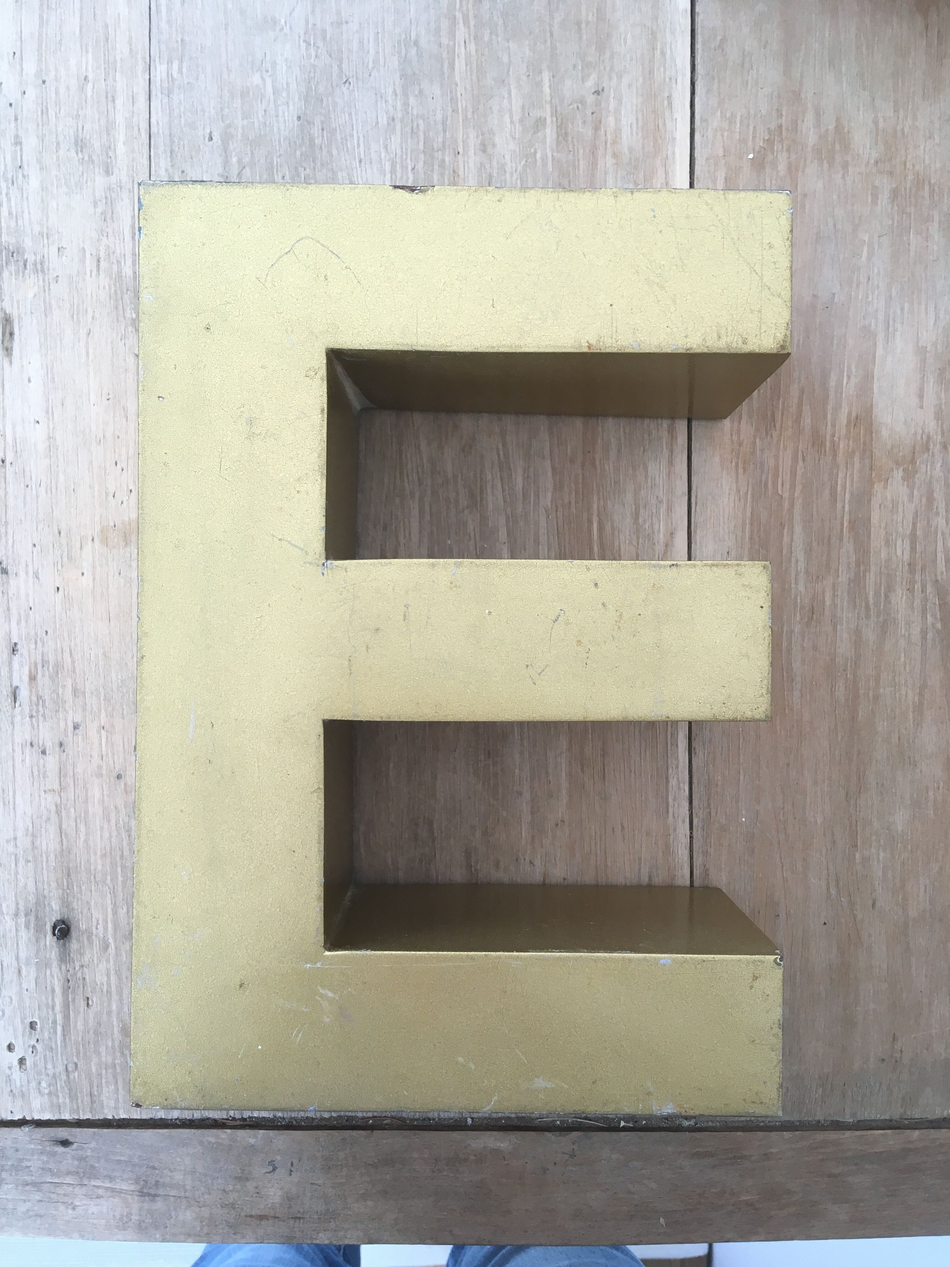 Golden vintage sign letter E