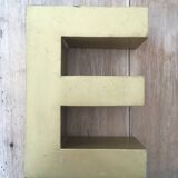 Golden vintage sign letter E