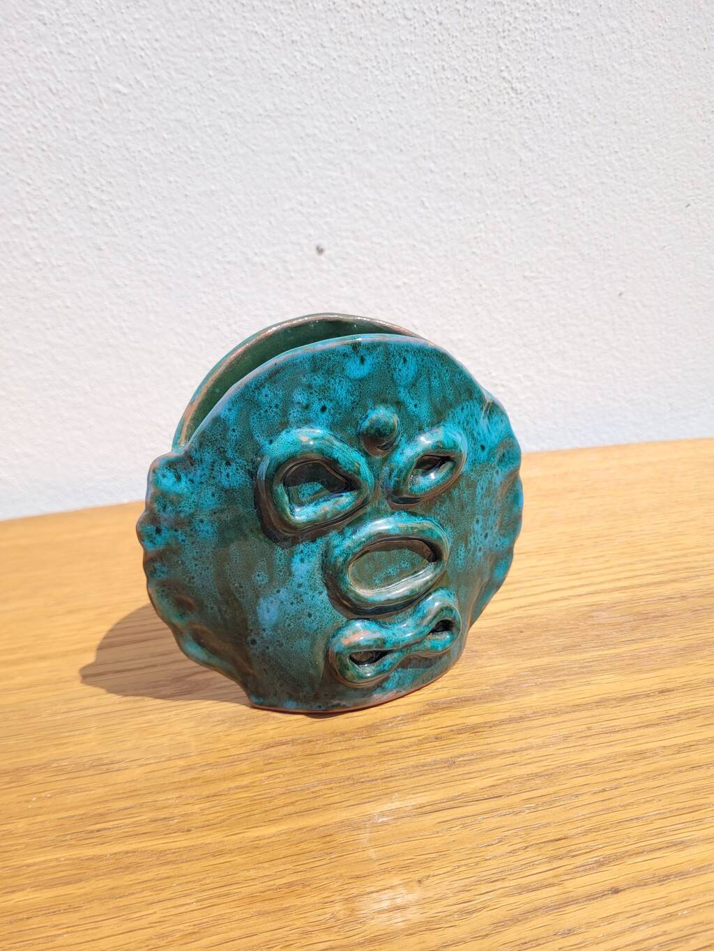 Turquoise glazed terracotta ceramic vase