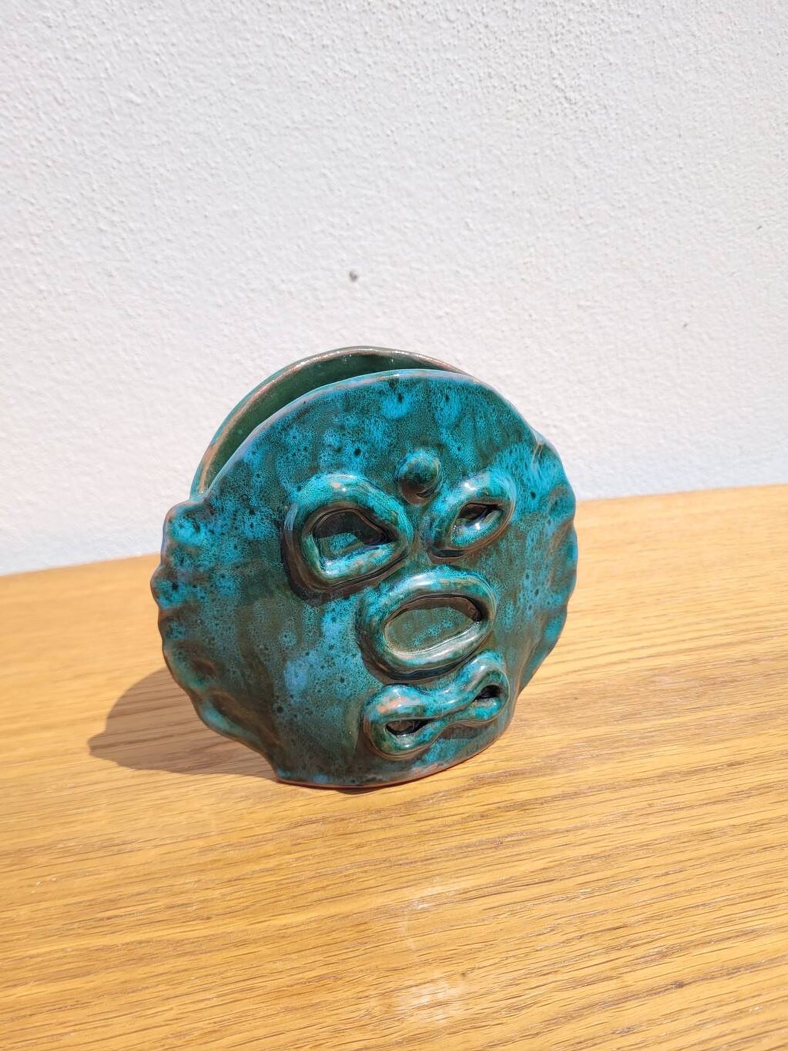 Turquoise glazed terracotta ceramic vase