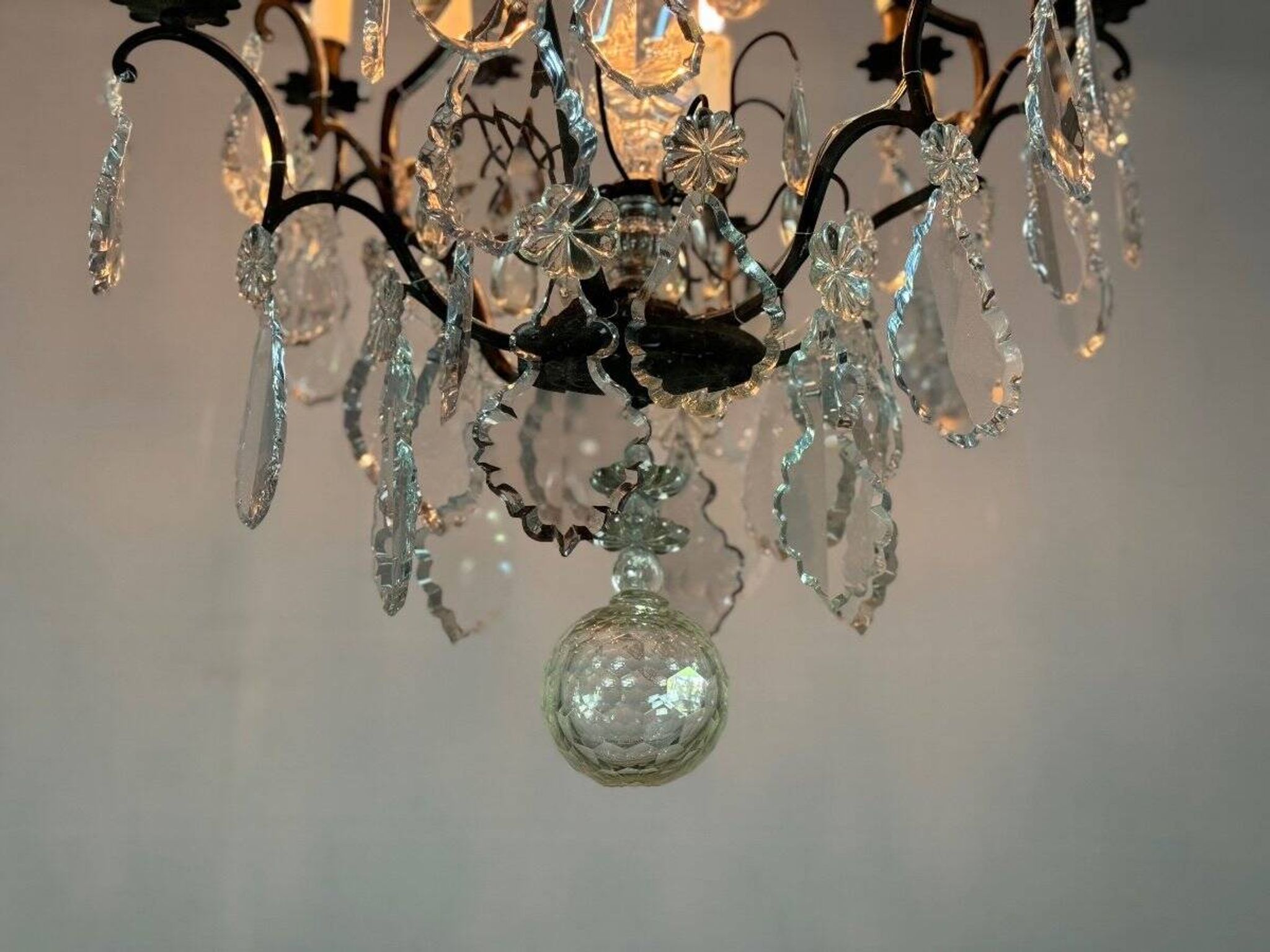 Black patinated bronze cage chandelier decorated with cut crystal pendants circa 1900
