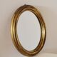 Miroir ovale cadre en bois doré 22 X 17 X 2 cm.