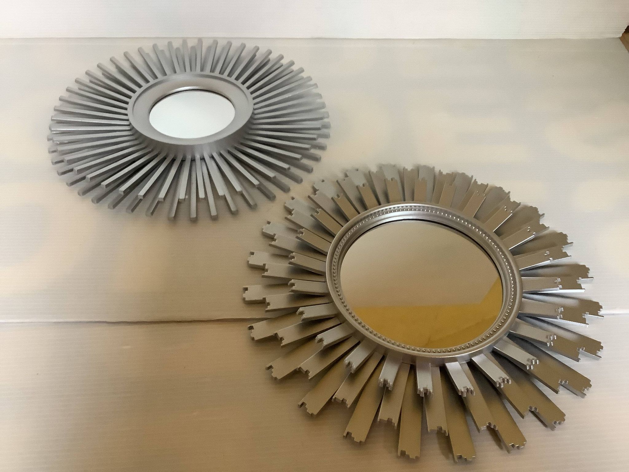 Pair of silver sun mirrors
