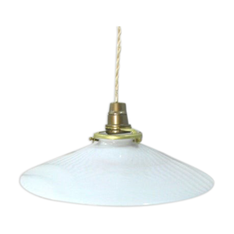 Hanging in opaque white glass.