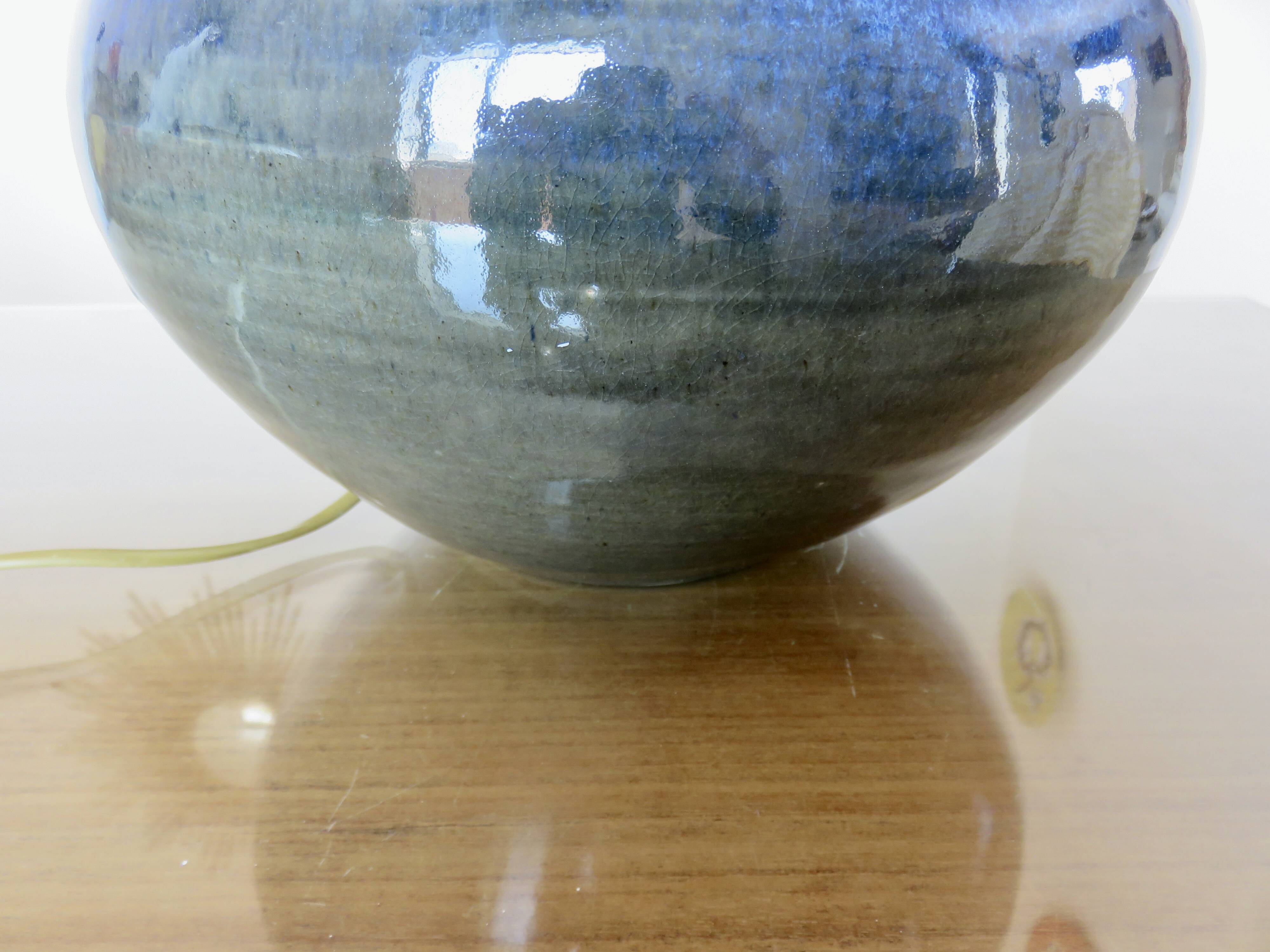 Impressive iridescent blue ceramic lamp with a gradient of green, circa 1960.