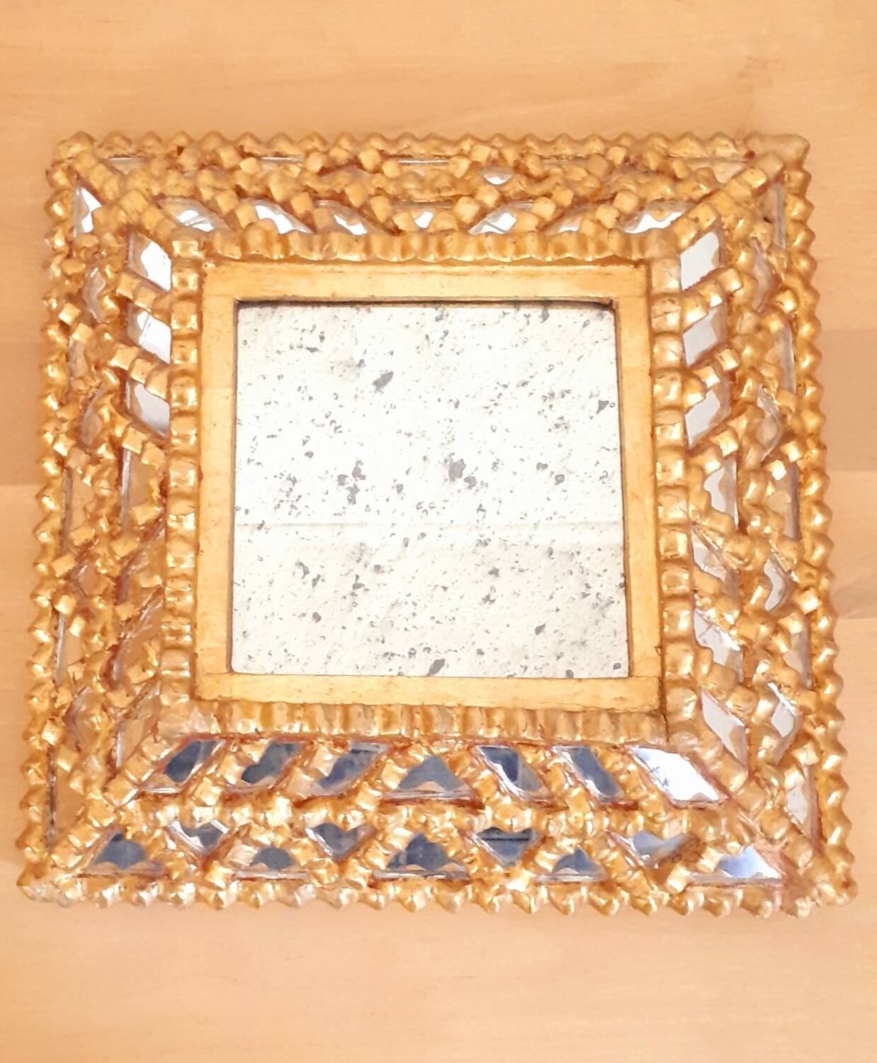Vintage gilded mirror with glazing beads