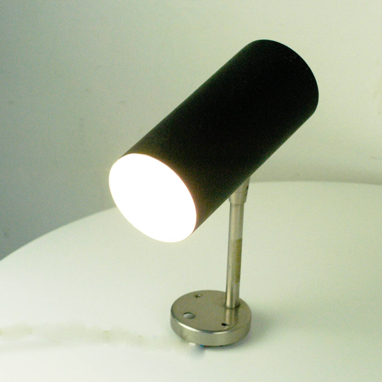 Austrian black cylindrical wall light by J.T. Kalmar, Vienna, mid-century.