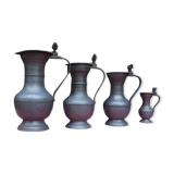 Lot of 4 tin pitchers