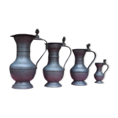 Lot of 4 tin pitchers