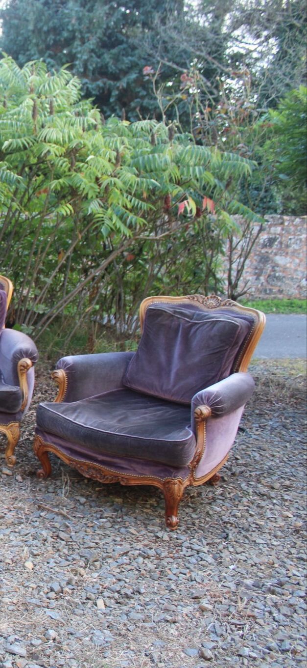 Two voltaire armchairs