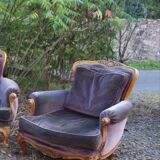 Two voltaire armchairs