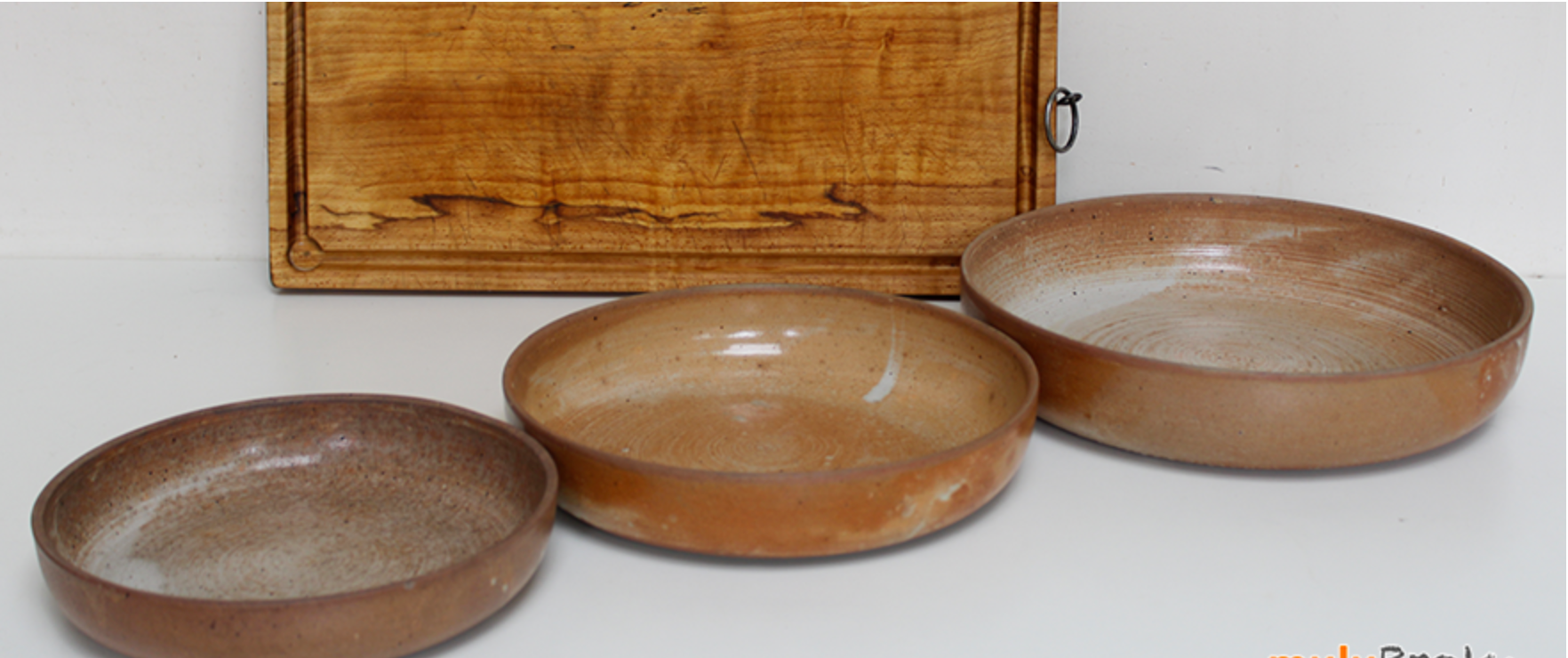 Set of trundle sandstone dishes