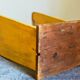 Art-populaire workshop stool in patinated painted wood