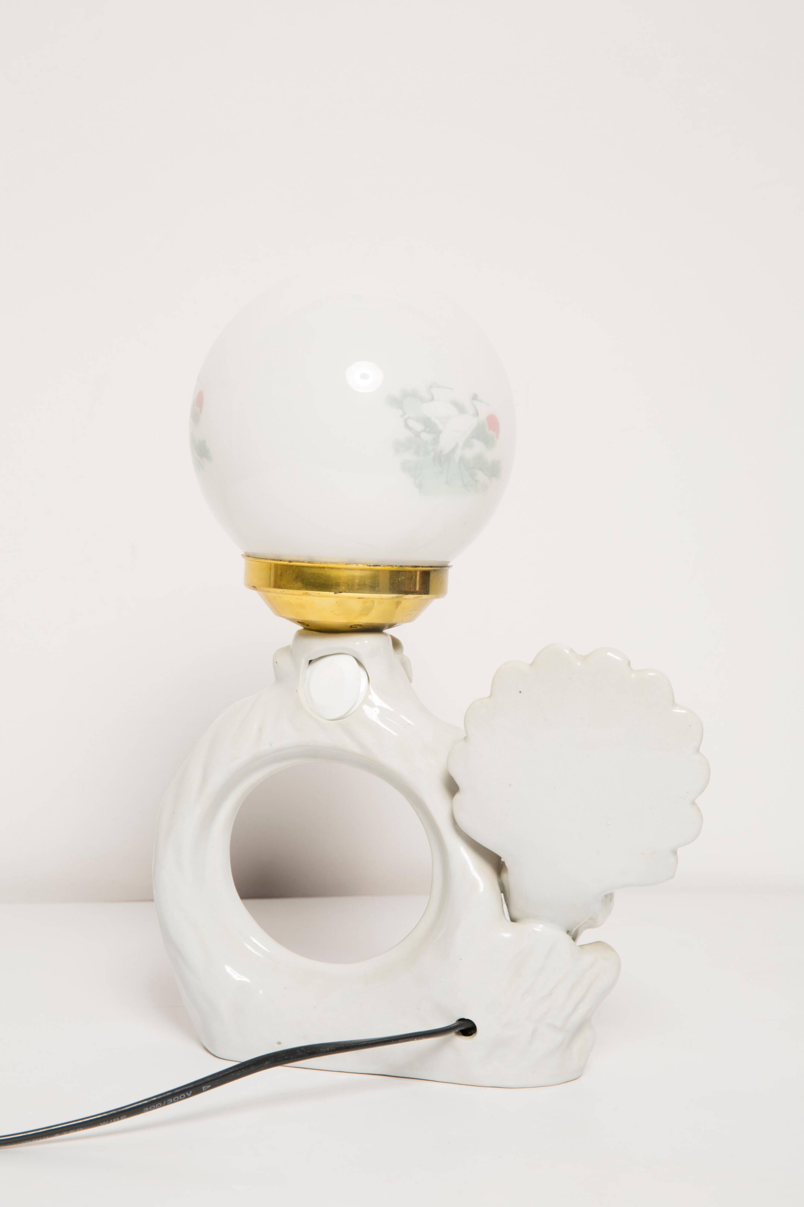 Mid-century white ceramic peacock table lamp, Europe, 1960s.