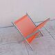 Vintage chrome and orange magazine rack from the 70s and 80s