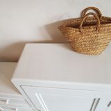 Old white asymmetrical chest of drawers