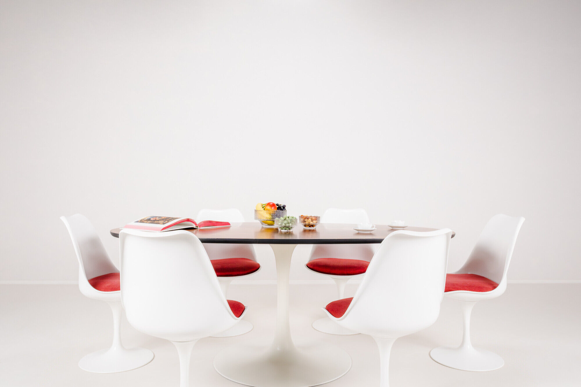 Oval dining table in rosewood by Maurice Burke for Arkana, England, 1960s