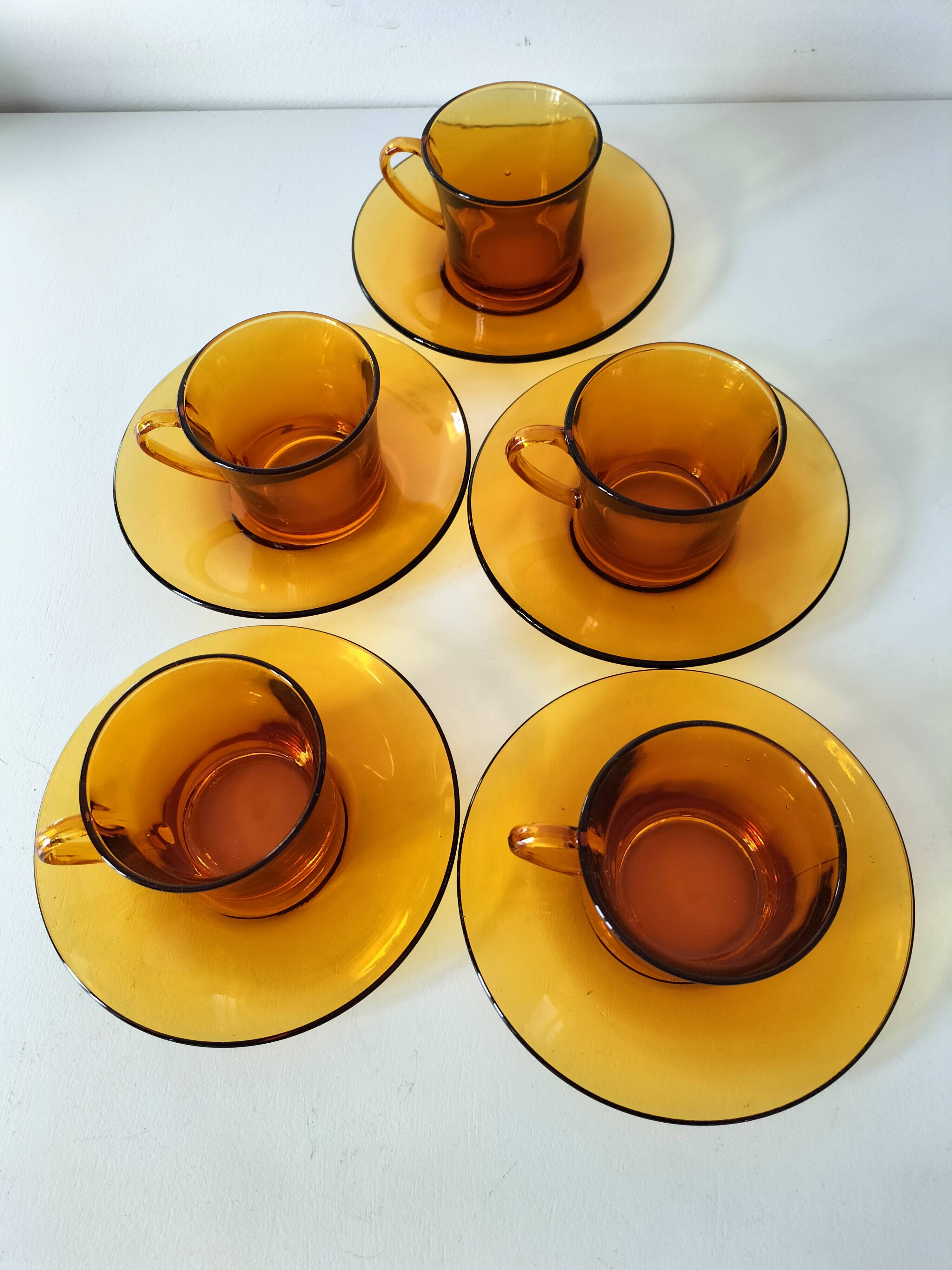 5 vintage amber Duralex cups and saucers