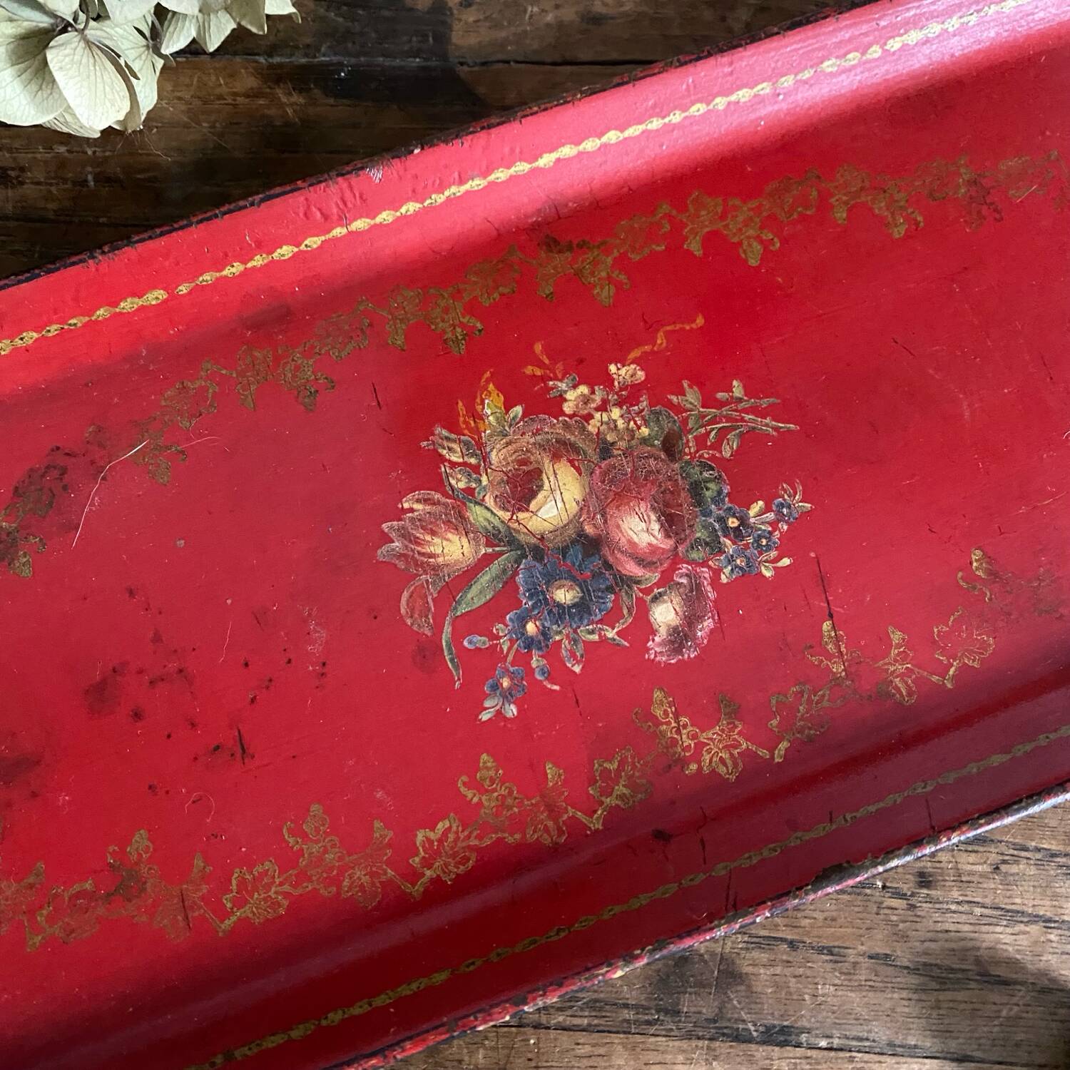 Antique metal tray with painted flowers
