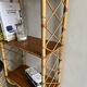 Rattan wall shelf