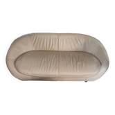 2 seater leather sofa in off-white with a rounded shape
