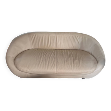 2 seater leather sofa in off-white with a rounded shape