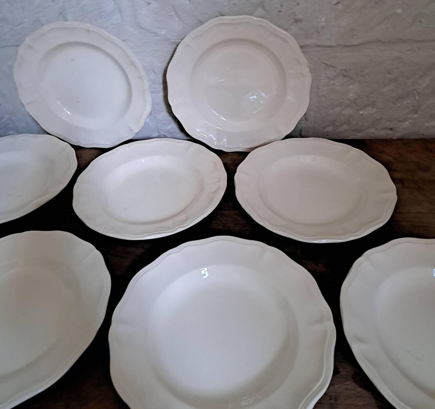 Set of 9 Sarguemines ivory soup plates