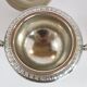 Silver sugar bowl with paw feet and ornate handles