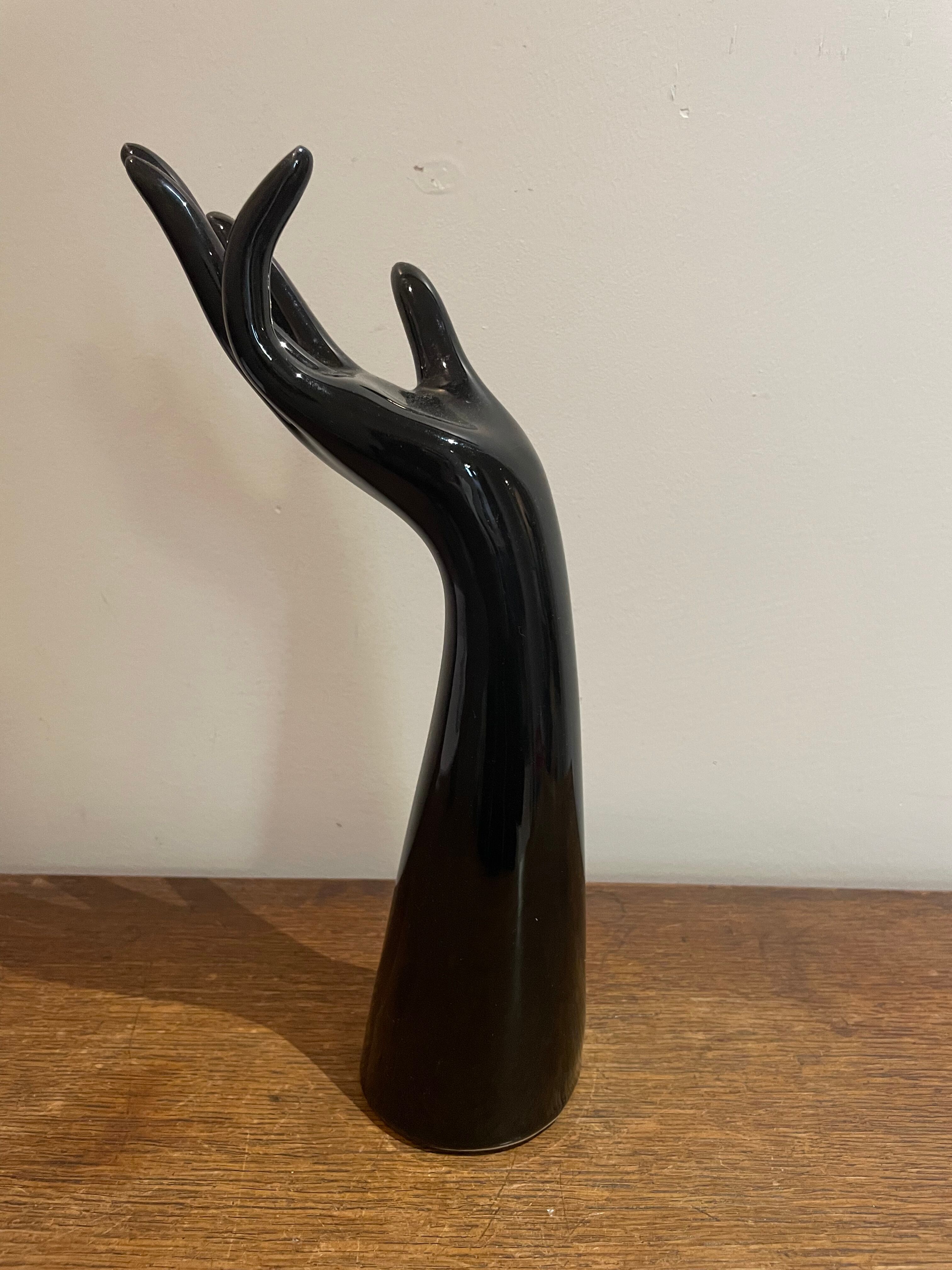 Black ceramic hand sculpture