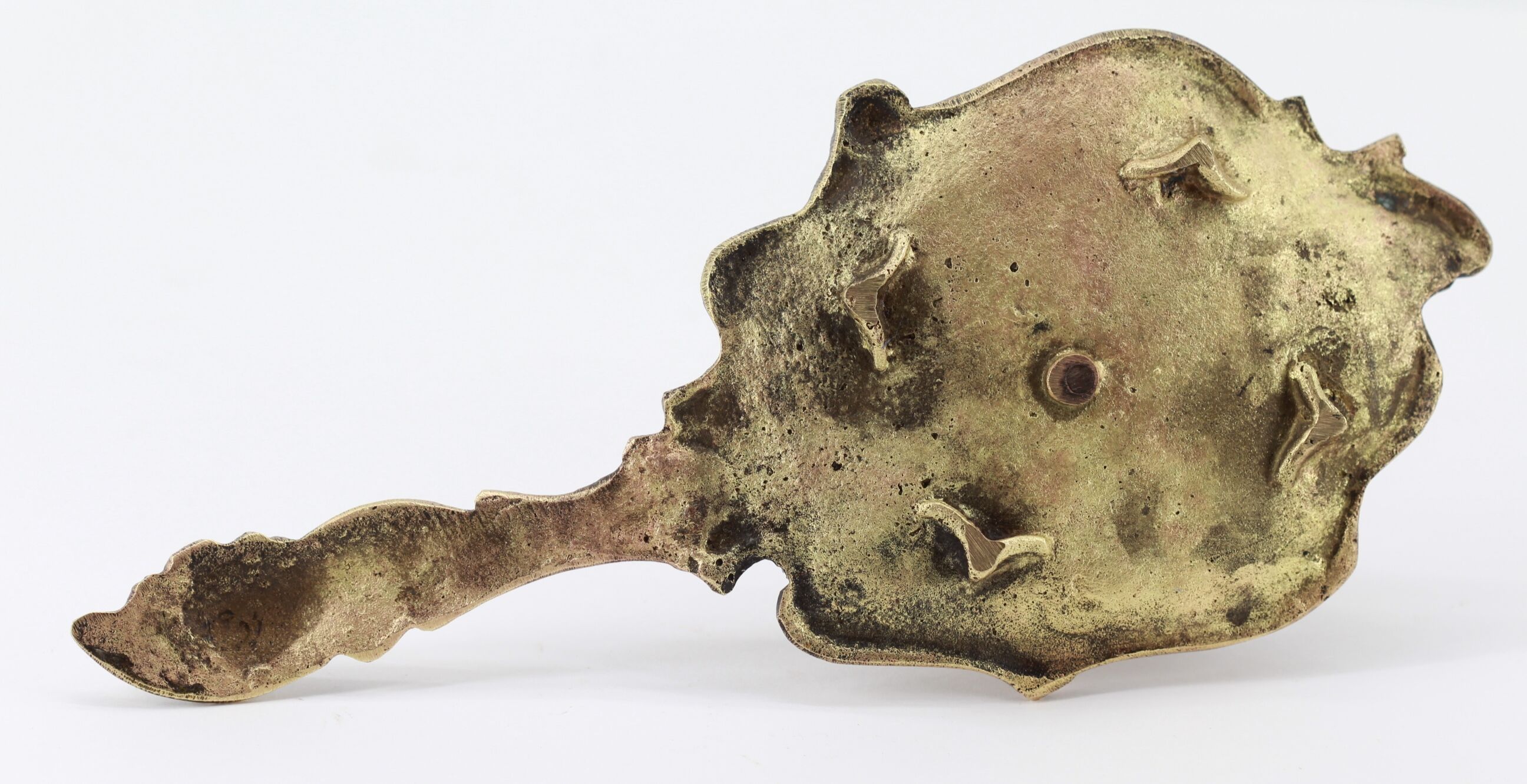 Old brass hand candle holder
