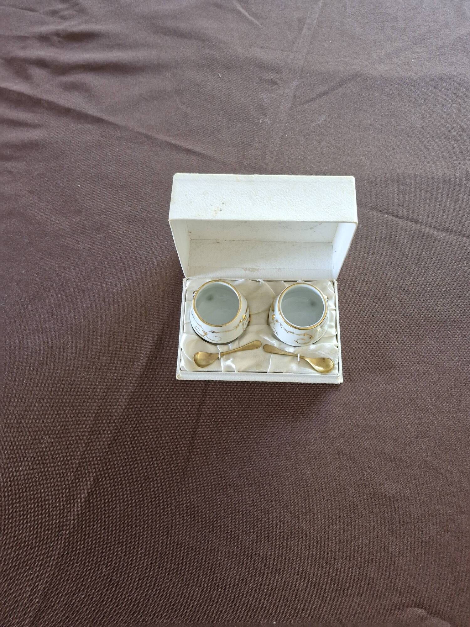 Vintage porcelain salt and pepper shakers.