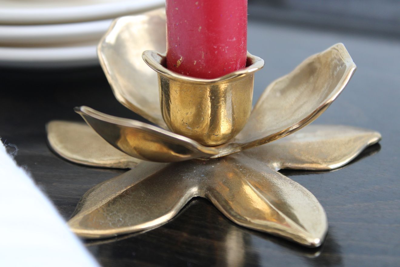 Golden brass candle holder