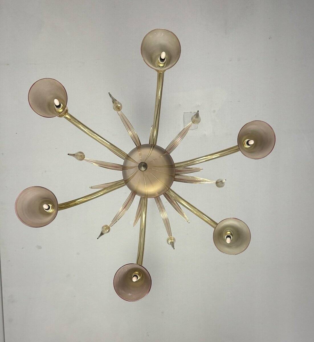 Venetian chandelier in beige/gray murano glass bordered with a red net