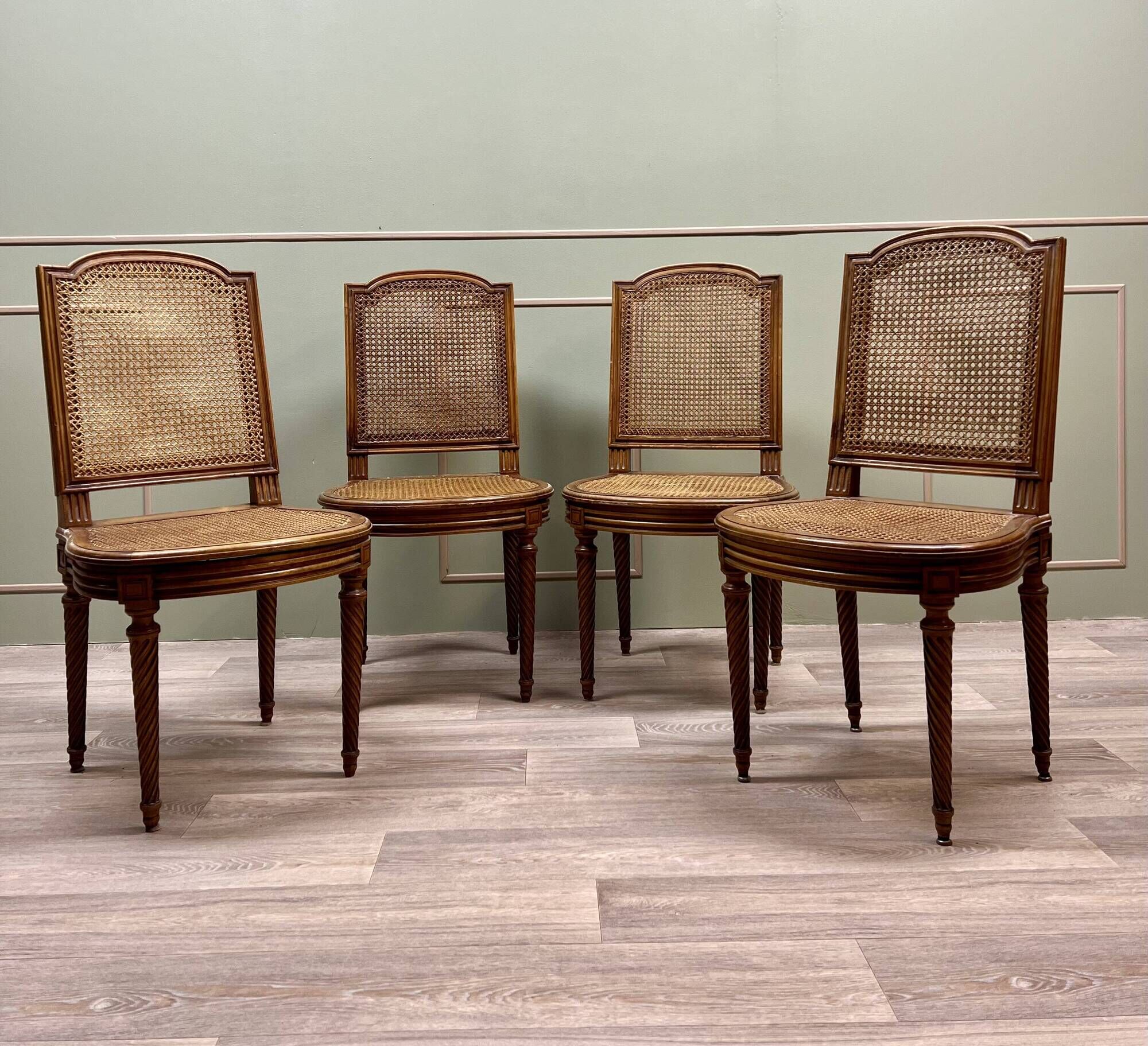 Suite Of Four Cane Chairs In Louis XVI Style Natural Wood