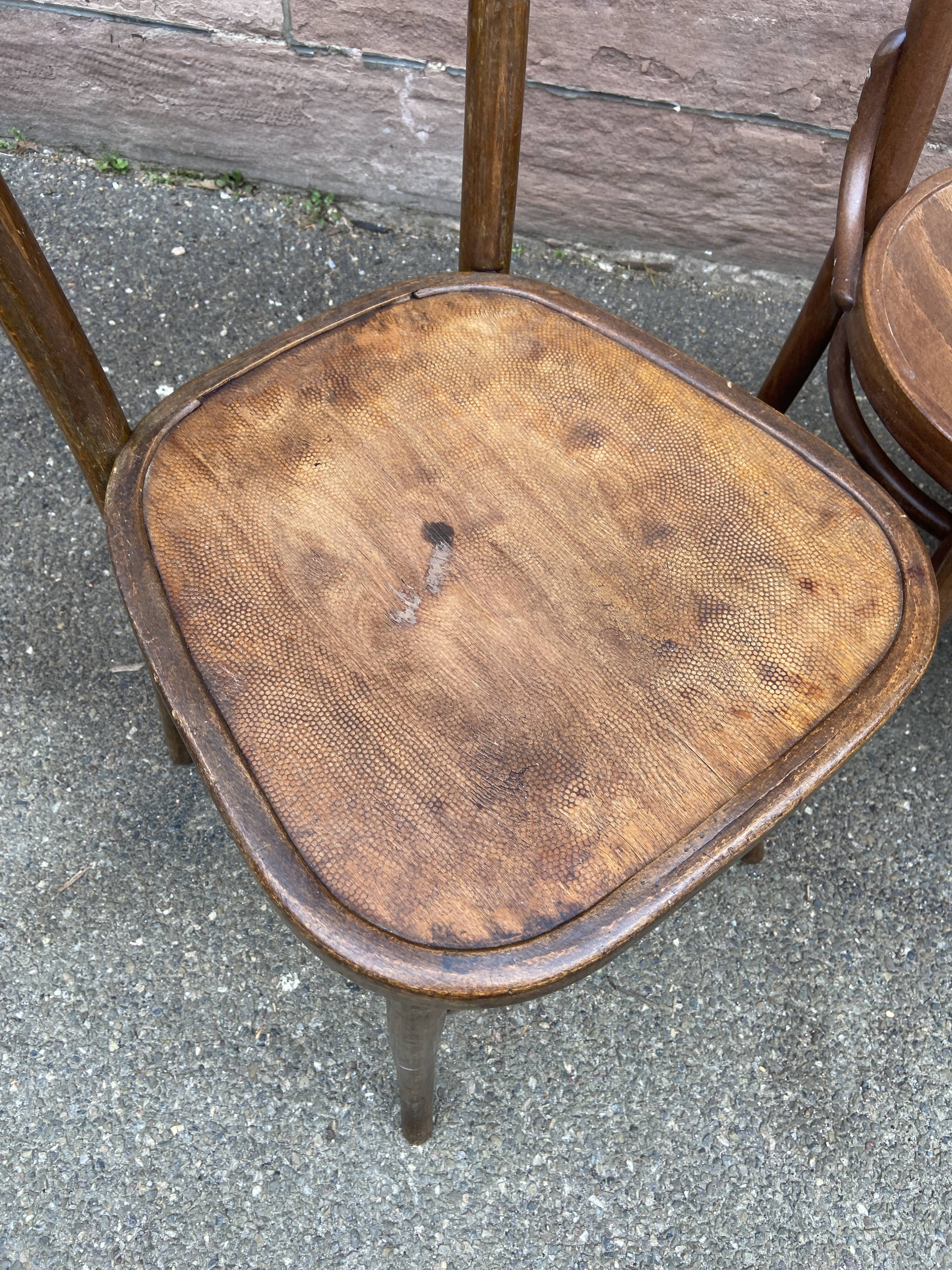 Lot 6 mismatched wooden bistro chairs