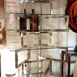 Articulated presentation shelf in chrome and glass. Italy 1970s