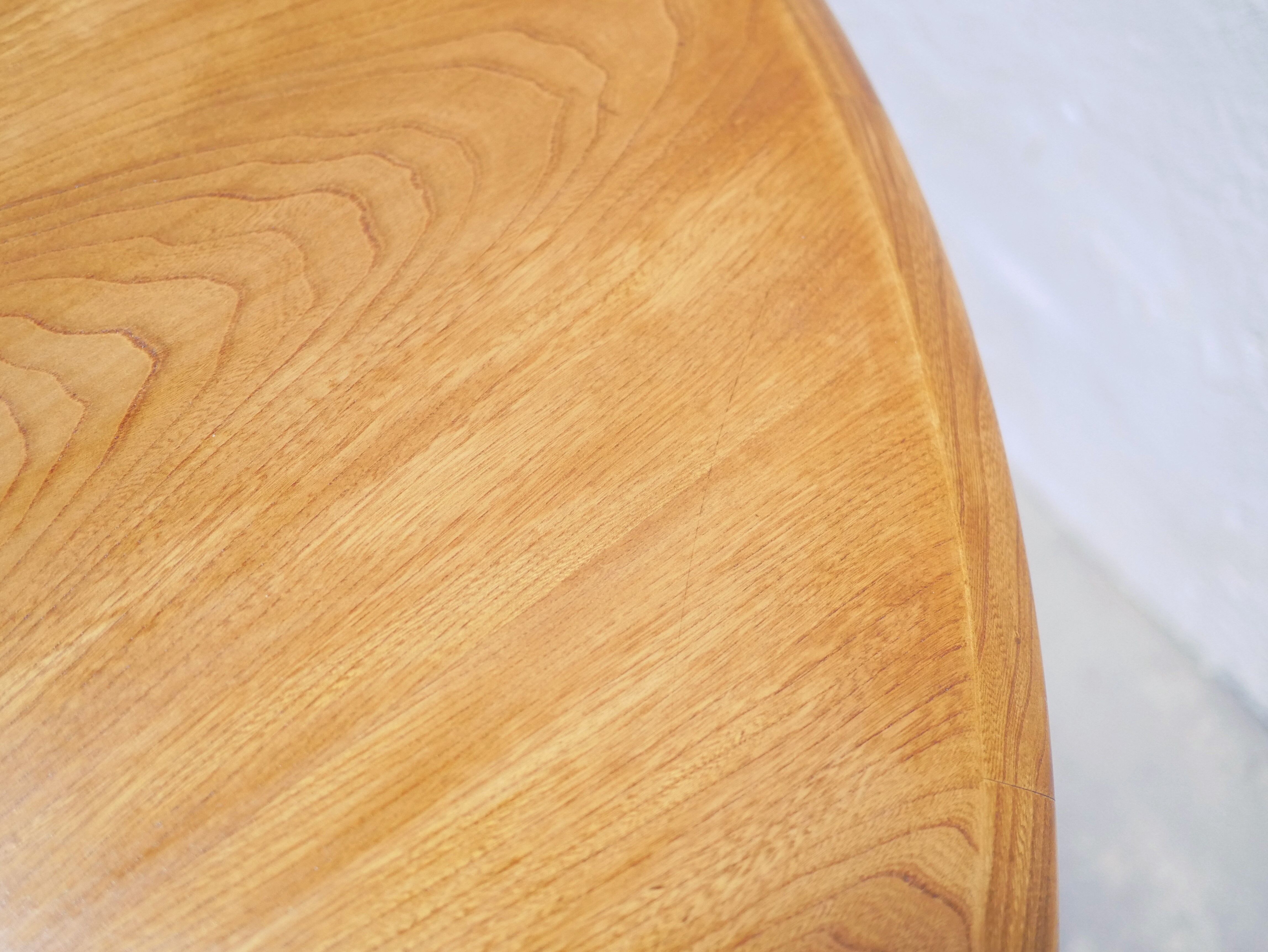 Vintage extendable round wooden dining table