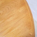 Vintage extendable round wooden dining table