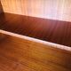 Storage cabinet with double compartment, metal feet circa 60's