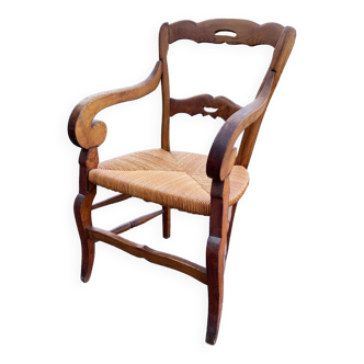 Walnut and straw armchair
